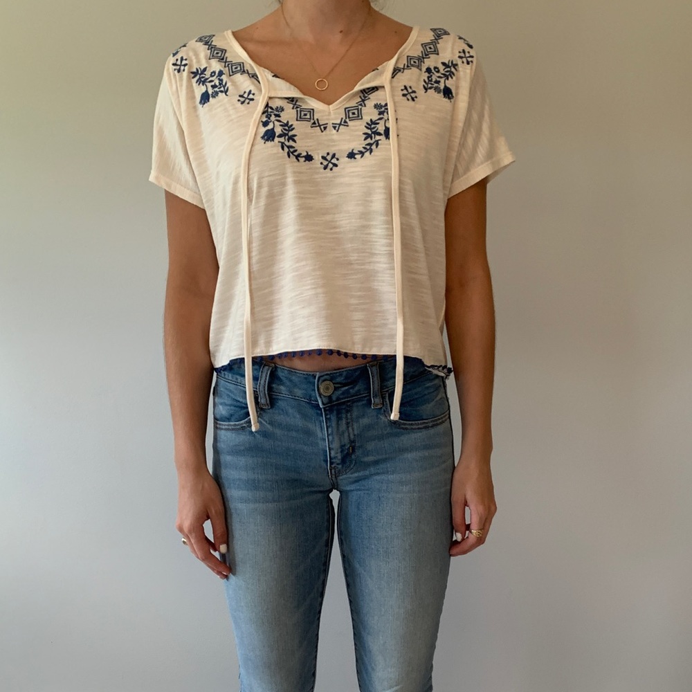 White and blue embroidered top